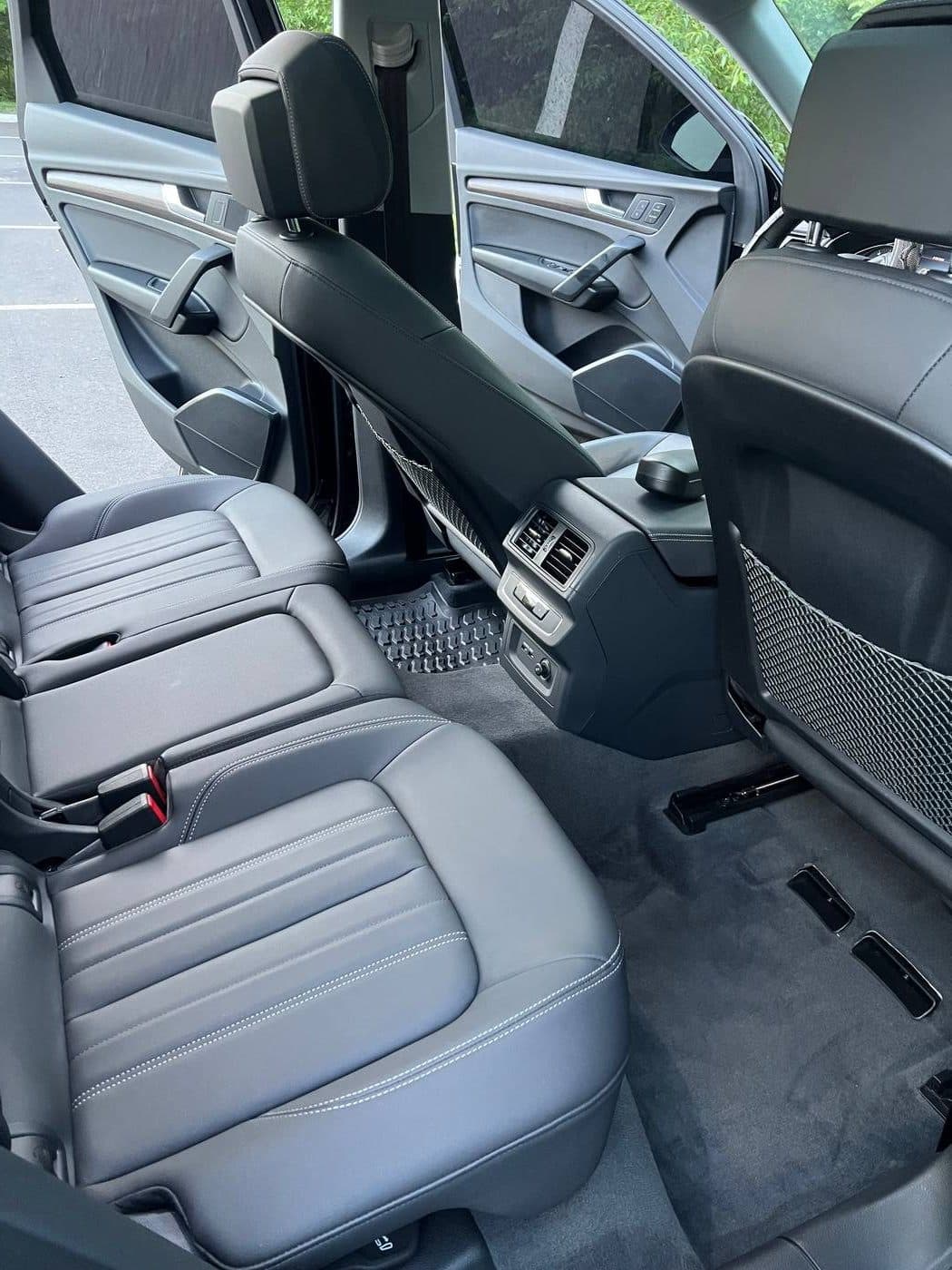 Spotless Audi Q5 rear interior with grey leather seats and clean carpets